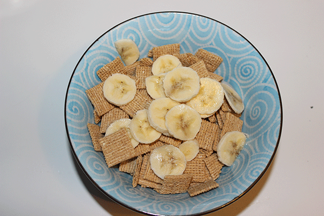 Typical Urban breakfast of banana and cereal. 