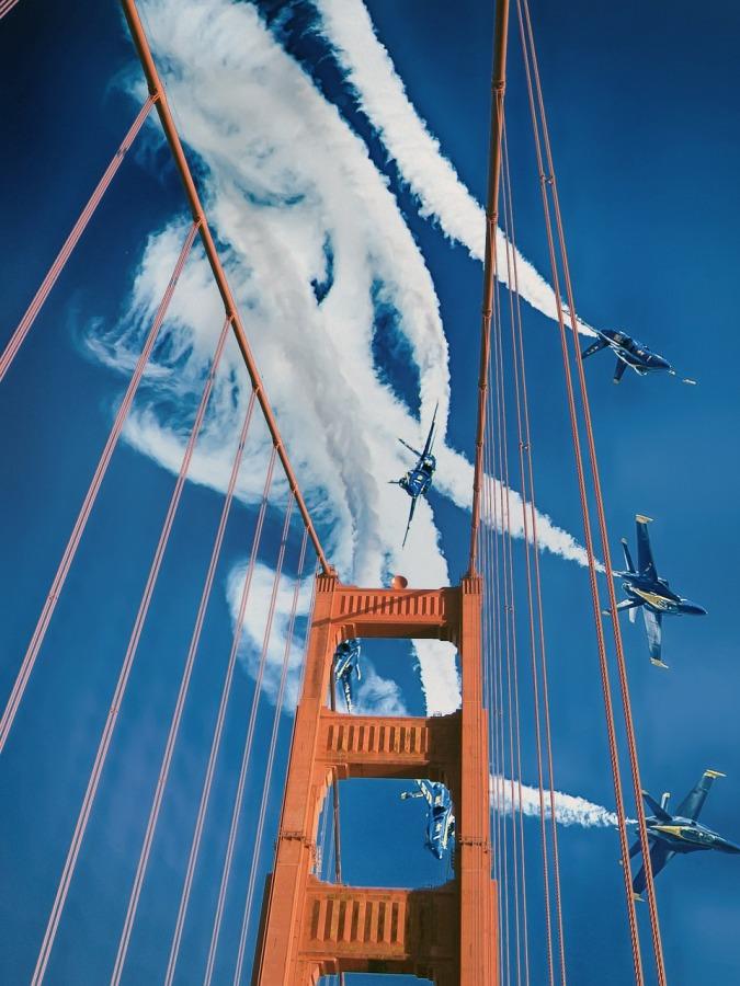 Blue Angels fly over the Golden Gate Bridge.