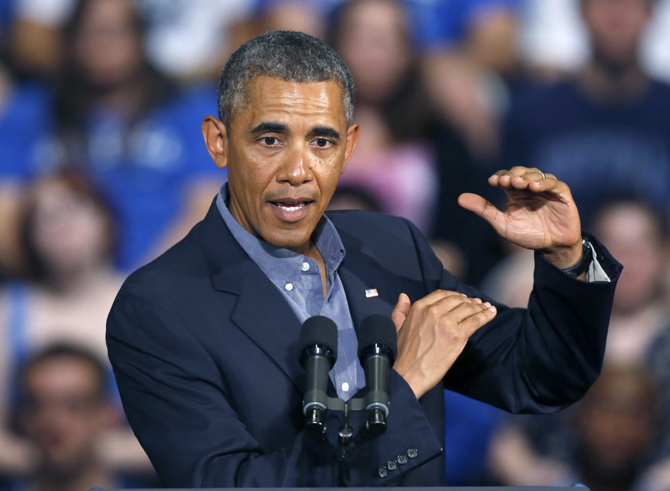 President Barack Obama gestures as he speaks at the University at Buffalo, the State University of New York, Thursday, Aug. 22, 2013 in Buffalo, N.Y., where he began his two day bus tour to speak about college financial aid. (AP Photo/Keith Srakocic)