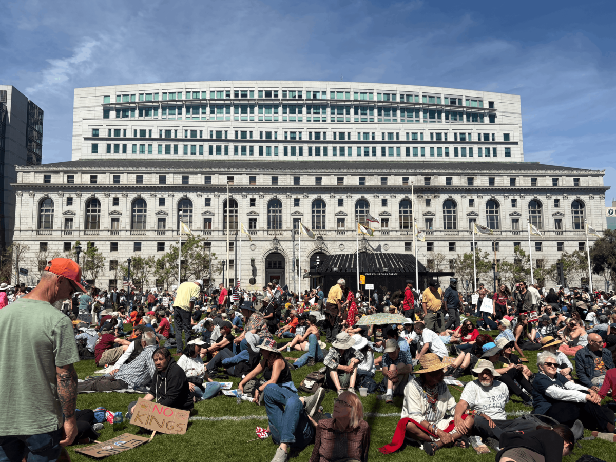 Demonstrators gather in front of the Earl Warren Building, home to the California Supreme Court.